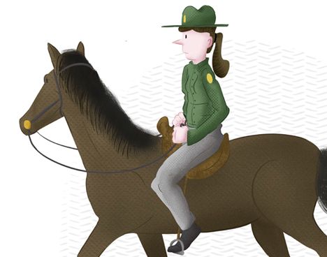 female park ranger riding a brown horse